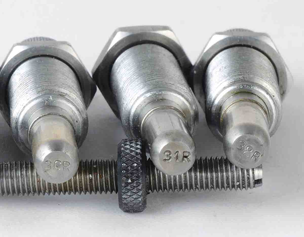 These Lyman M-Die .30-, .31- and .32-caliber expander plugs are stamped with an R on the plugs and were designed for rifle cartridges, so they are longer than pistol cartridge plugs.